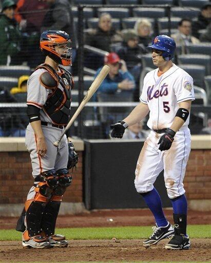 New York Mets David Wright throws his bat after striking out