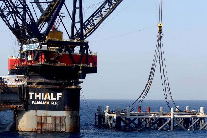 (FILES) This file picture taken on January 31, 2019 shows a view of the SSCV Thialf crane vessel laying the newly-arrived foundation platform for the Leviathan natural gas field in the Mediterranean Sea, about 130 kilometres (81 miles) west of the coast of the Israeli city of Haifa. - The French oil and gas group Total irritated Israel after considering it is too complicated to invest in the country, according to a Financial Times article. (Photo by Marc Israel SELLEM / POOL / AFP)MARC ISRAEL SELLEM/AFP/Getty Images ** OUTS - ELSENT, FPG, CM - OUTS * NM, PH, VA if sourced by CT, LA or MoD **
