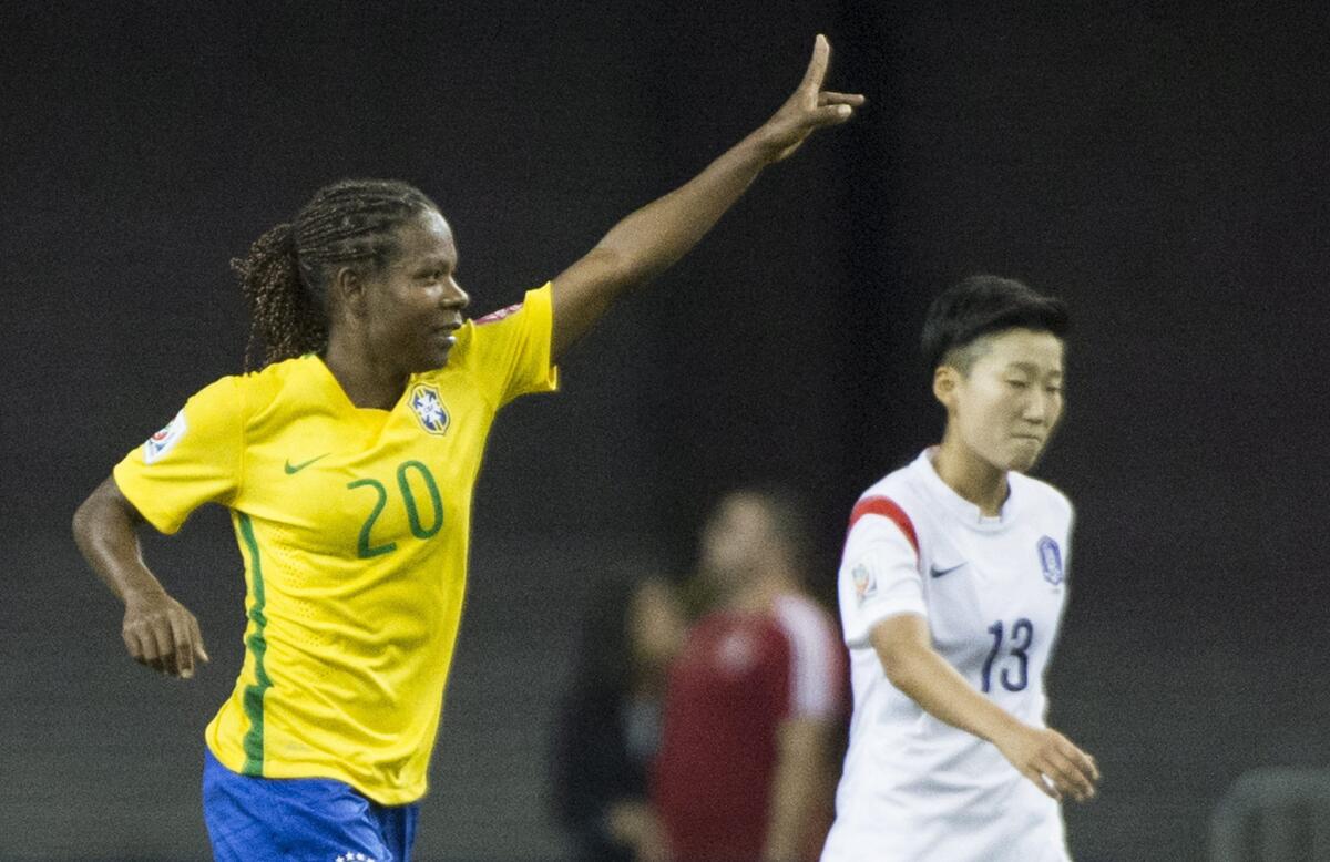 Brazil's Formiga celebrates after scoring against South Korea during the first half of a Women's World Cup match Tuesday. Brazil beat South Korea, 2-0.