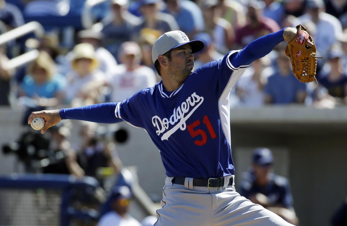 Zach Lee throws for the Dodgers during a spring training game Friday against the Milwaukee Brewers.