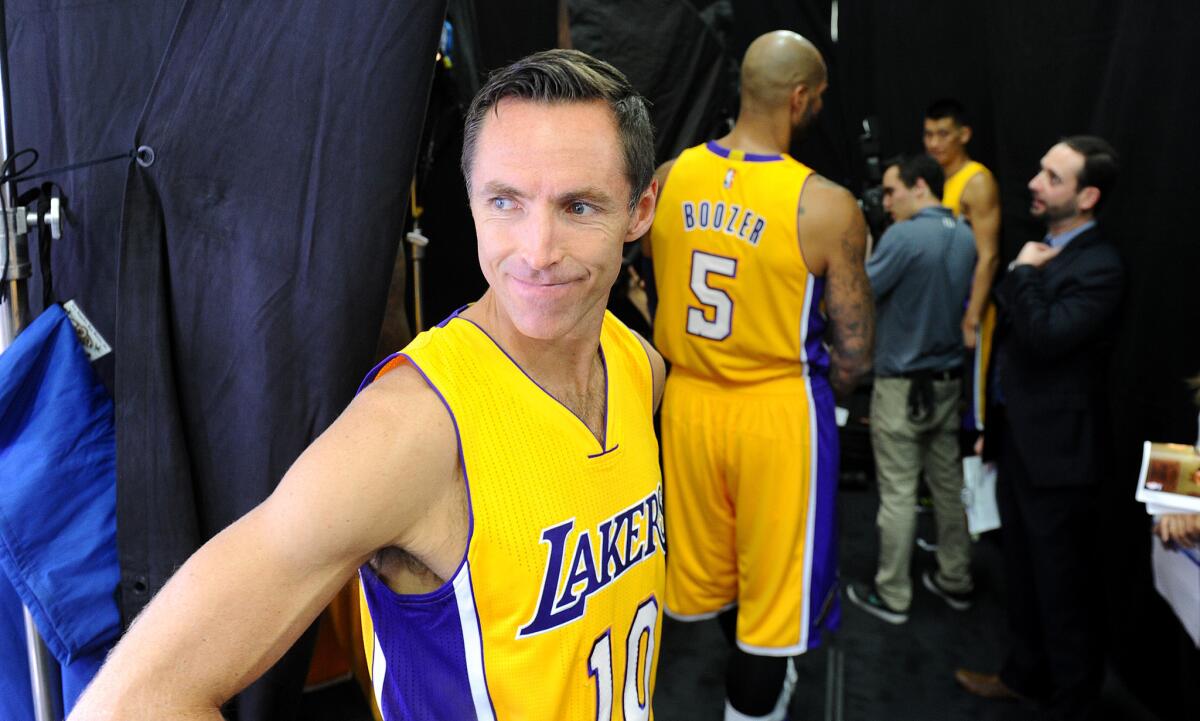 Steve Nash waits to have his photo taken during Lakers media day last fall. He never played in the regular season after re-injuring his back in the preseason.