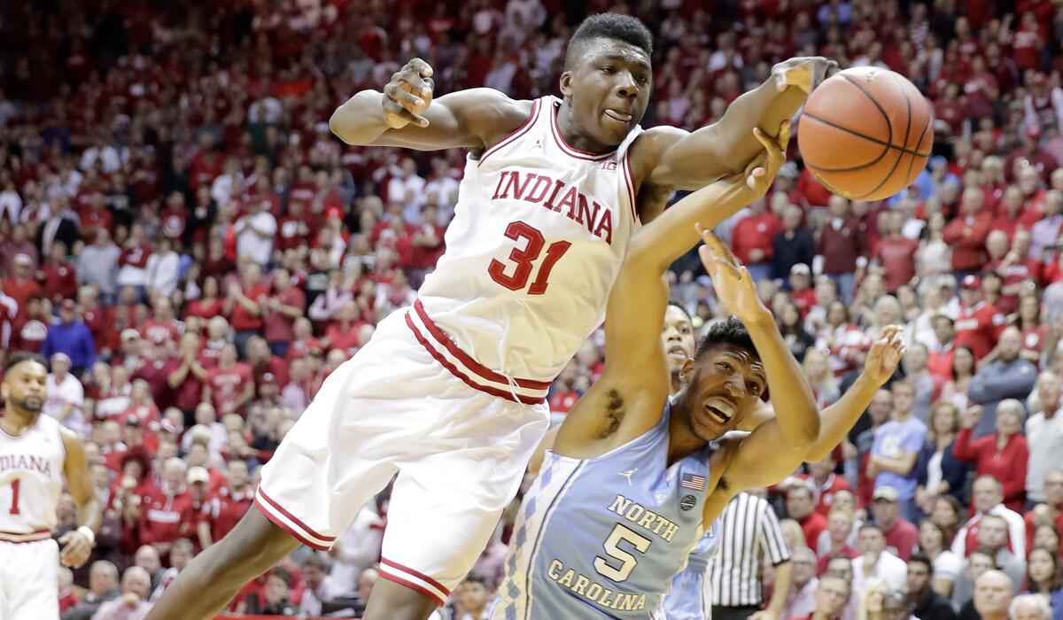 Indiana's Thomas Bryant (31) reaches for a loose ball during the game against North Carolina on Wednesday.