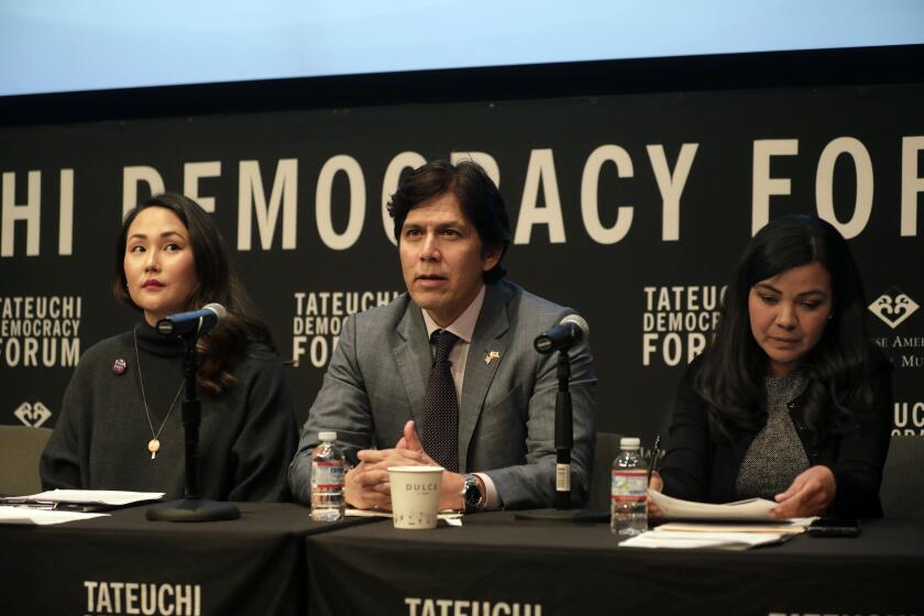 LOS ANGELES, CALIFORNIAÑFEB. 5, 2020ÑCyndi Otteson, left, former State Sen. Kevin de Leon, center, Raquel Zamora, right and others takes part in a pre-election forum for the LA City Council 14th District in Little Tokyo on Feb. 5, 2020. (Carolyn Cole/Los Angeles Times)