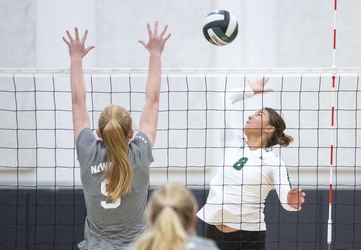 Sage Hill's Brooke Thomassen hits against Newport Harbor's Emma Coatsworth.