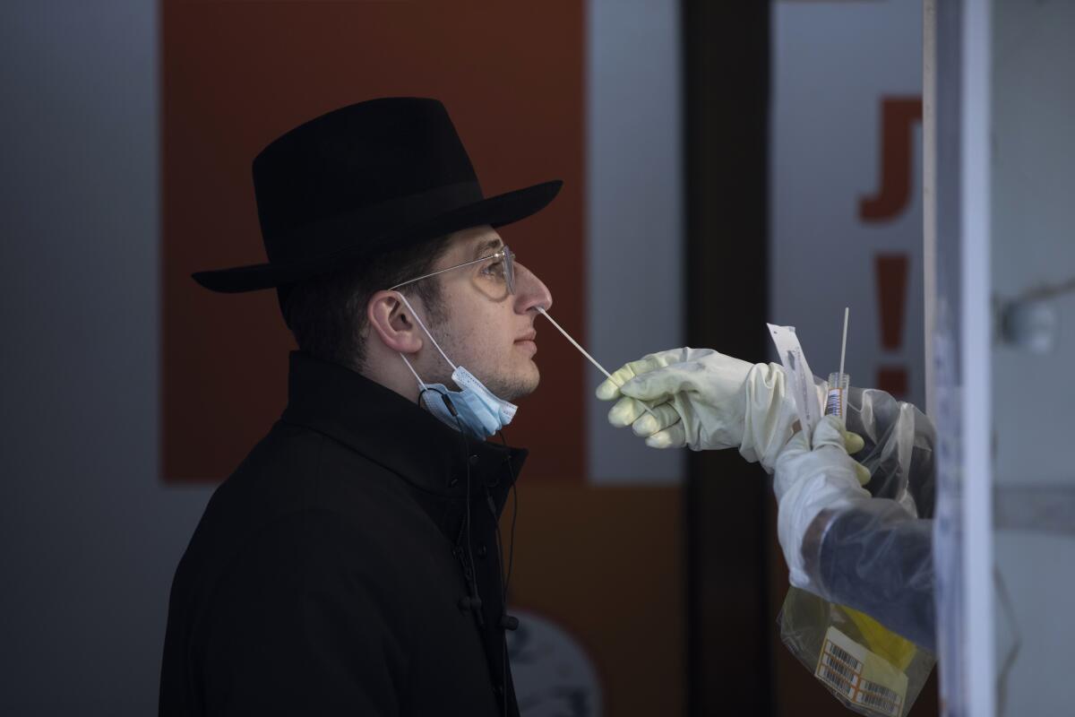 Ultra-Orthodox Jewish man getting tested for coronavirus