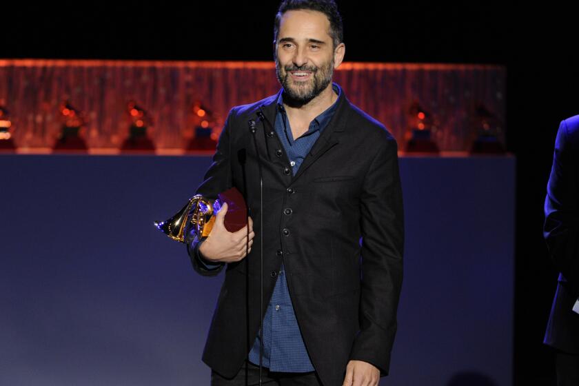 Singer-songwriter Jorge Drexler accepts the Latin Grammy for record of the year for his album "Bailar En La Cueva," which featured Ana Tijoux, during a Nov. 20 ceremony in Las Vegas.