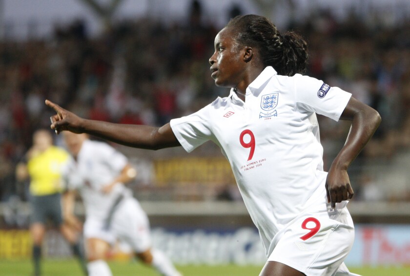 England's Eniola Aluko celebrates after scoring during a goal against Russia in 2009 