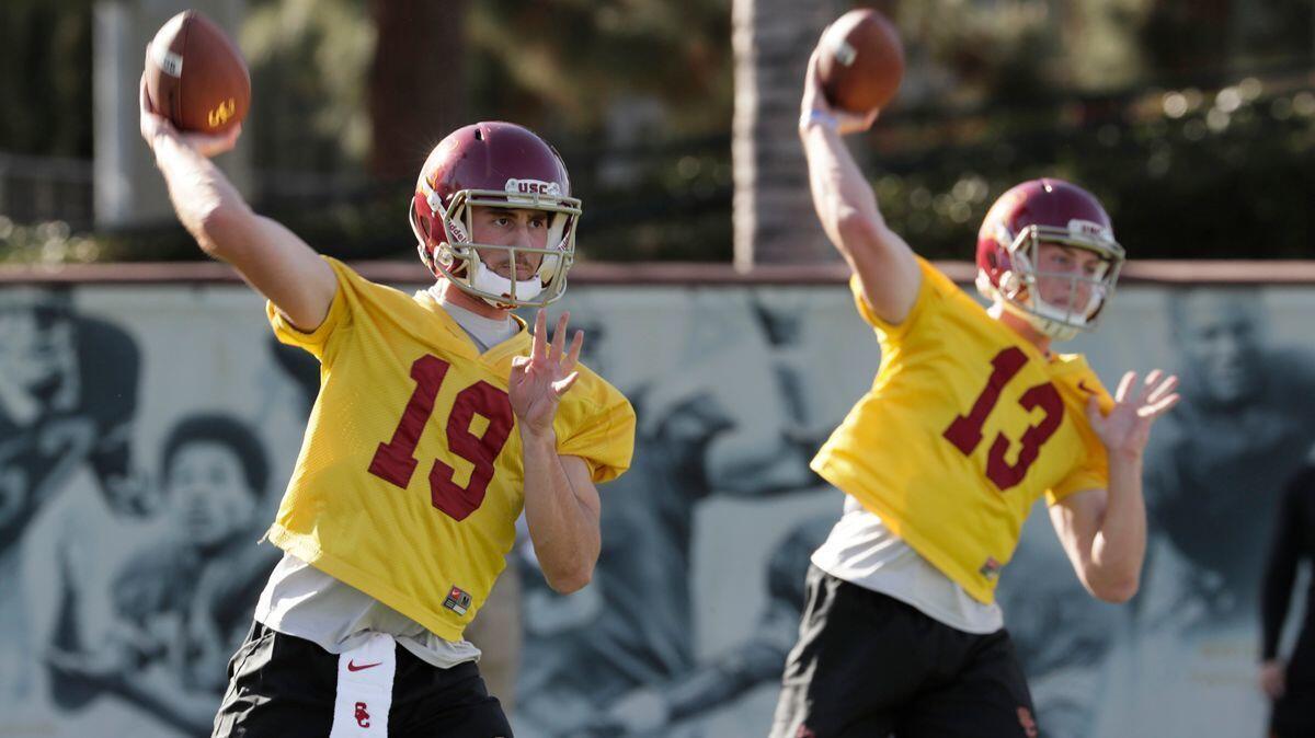 USC quarterbacks Matt Fink (19) and Jack Sears (13) at Trojans spring football practice at USC Howard Jones Field.