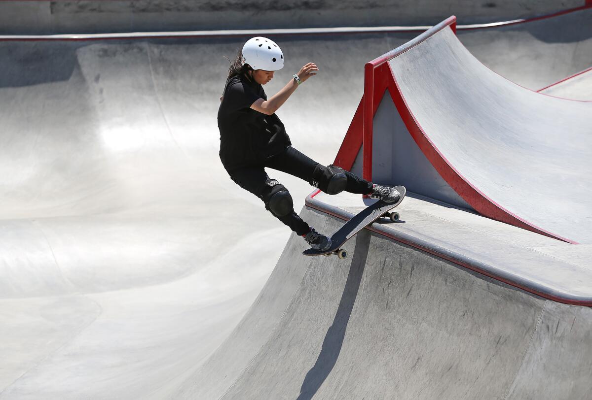 Michelle Yoon skates on the way to a third-place finish in the women's division of the Vans Park Series Americas Regional Championships on Friday at Vans Off the Wall Skatepark in Huntington Beach.