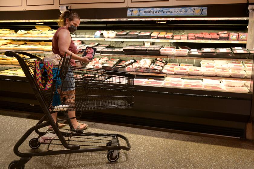 WOODBRIDGE, NEW JERSEY - AUGUST 26: Clark resident Jen Valencia still works part time for Instacart at Wegman's market on August 26, 2020 in Woodbridge, New Jersey. The pandemic has prompted a major spike in on-demand grocery shopping and delivery, making Instacart profitable for the first time since its founding in 2012. (Photo by Michael Loccisano/Getty Images)