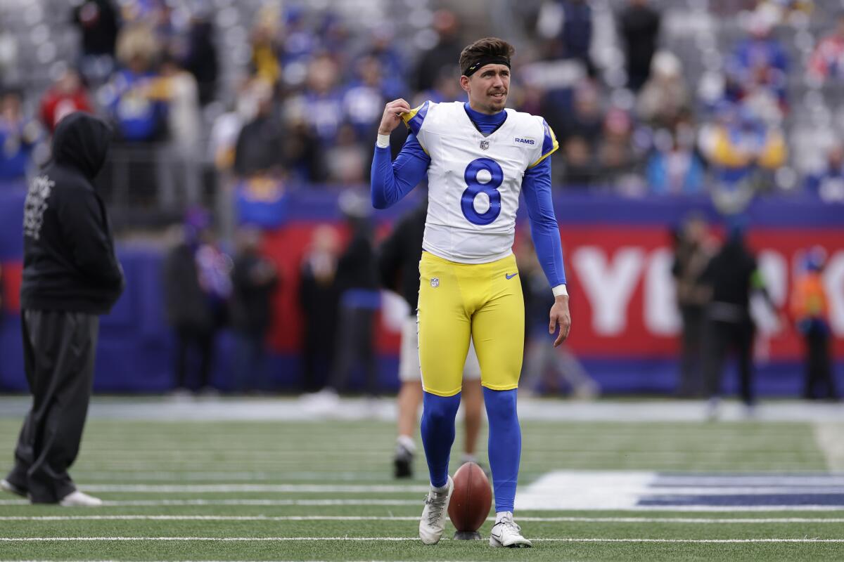 Kicker Lucas Havrisik (8) warms up before the Rams' road game against the Giants. 