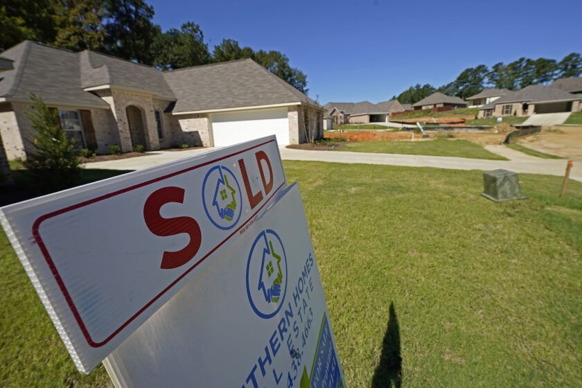 FILE - A "SOLD" sign decorates the lawn of a new house in Pearl, Miss., on Sept. 23, 2021. Homeowner equity climbed to record highs in the first half of 2022, though its rate of growth is slowing as the housing market cools. (AP Photo/Rogelio V. Solis, File)