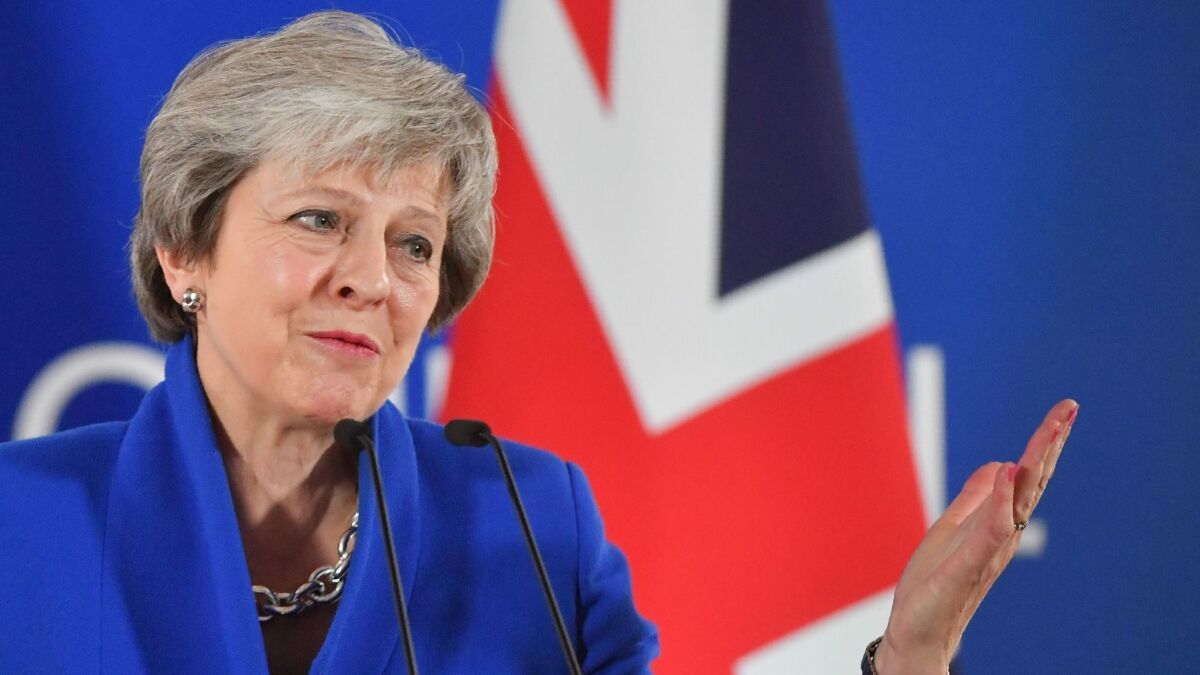 British Prime Minister Theresa May speaks at a news conference after the European Council endorsed the draft "Brexit" withdrawal agreement on Nov. 25, 2018, in Brussels.