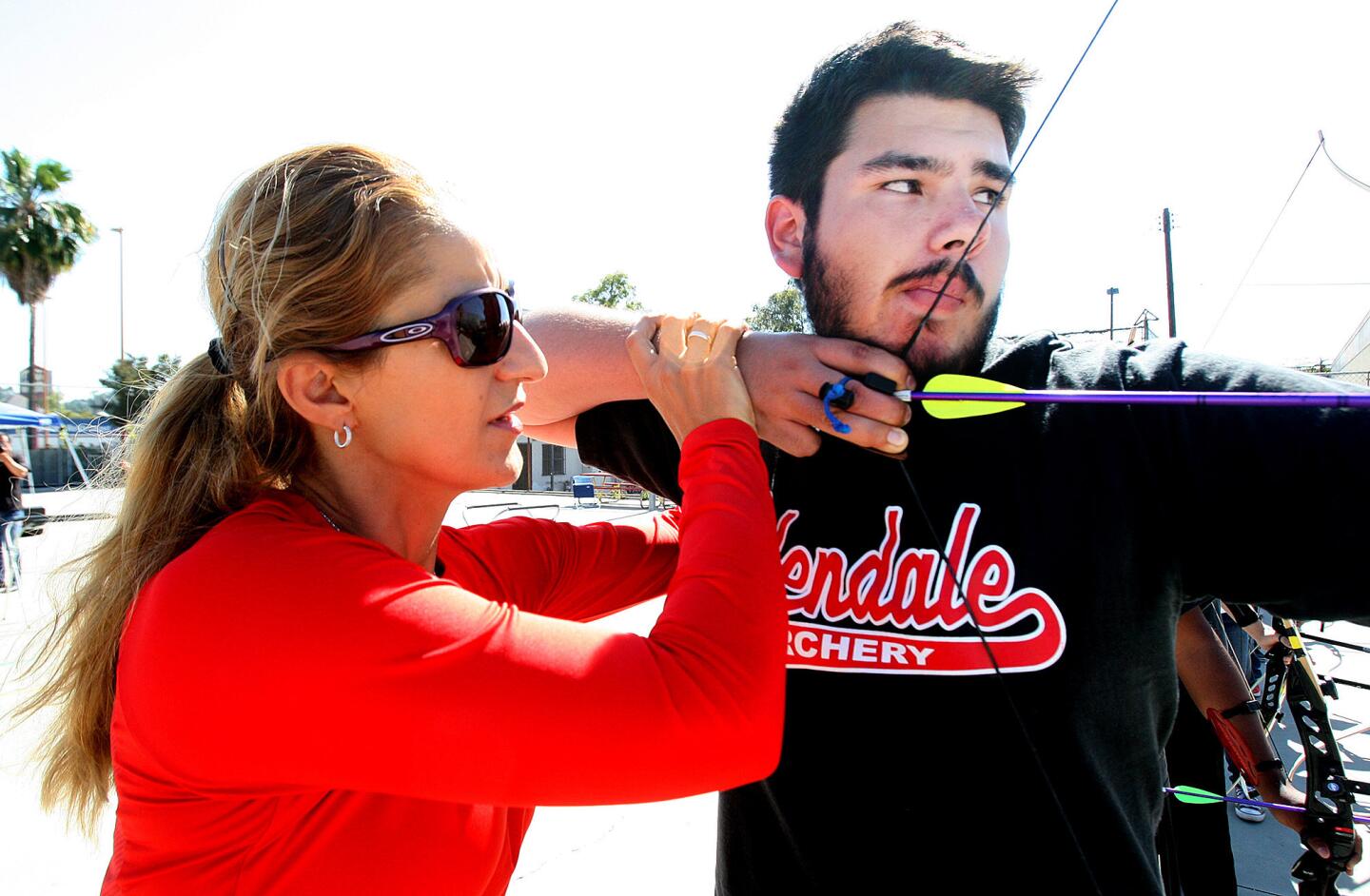 Photo Gallery: Olympic archer Khatuna Lorig visits to help Glendale High School archery team