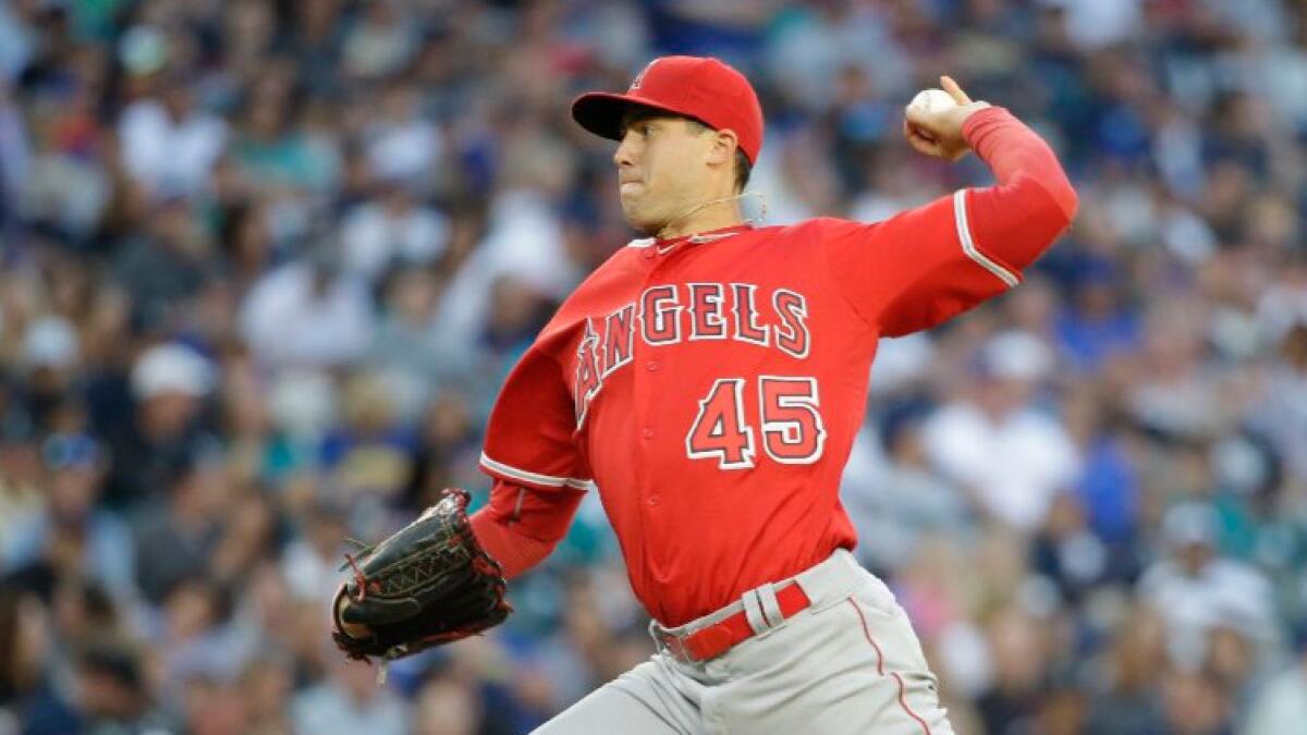 Tyler Skaggs pitches during the Angels' 8-6 loss to the Seattle Mariners on Aug. 6 in Seattle.