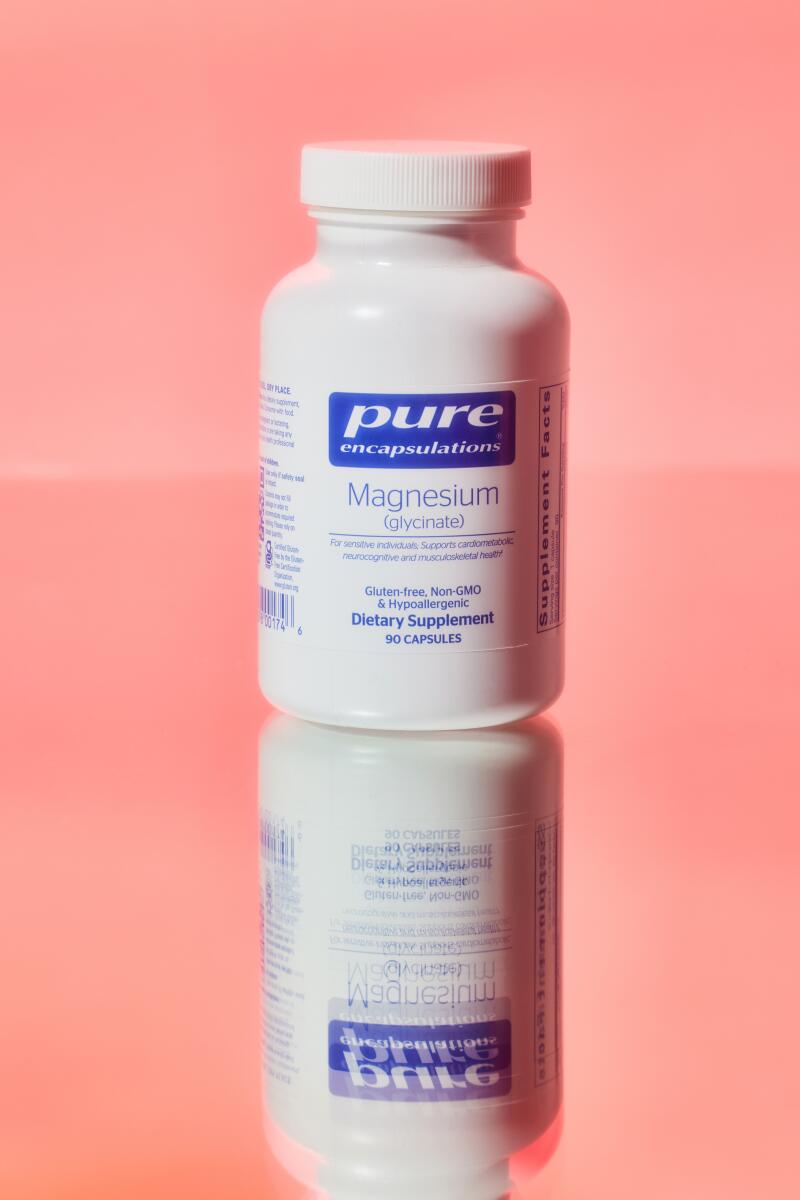 Pure Encapsulations magnesium capsules, used as a dietary supplement.