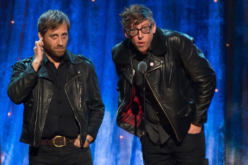 Dan Auerbach, left, and Patrick Carney of the Black Keys introduce Steve Miller at the 31st Annual Rock and Roll Hall of Fame induction ceremony last week in New York.