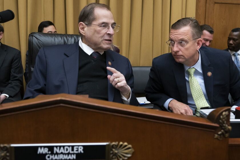House Judiciary Committee Chair Jerrold Nadler, D-N.Y., joined at right by Ranking Member Doug Collins, R-Ga., prepares for the start of a hearing on The Equality Act, a comprehensive nondiscrimination bill for LGBT rights, on Capitol Hill in Washington, Tuesday, April 2, 2019. Nadler is preparing subpoenas seeking special counsel Robert Mueller's full Russia report as the Justice Department appears likely to miss an April 2 deadline set by Democrats for the report's release. (AP Photo/J. Scott Applewhite)
