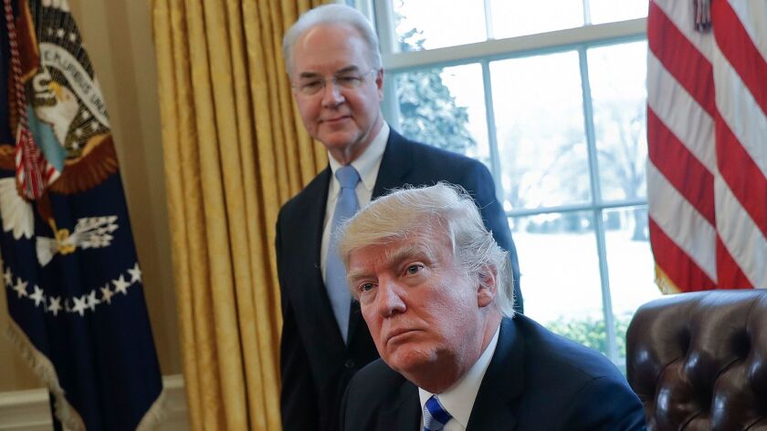 Is the answer staring them in the face? President Trump, foreground, ponders Obamacare repeal with Health and Human Services Secretary Tom Price during an Oval Office meeting in March.