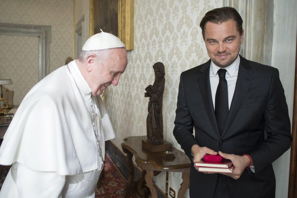 Pope Francis and actor Leonardo DiCaprio meet during a private audience at the Vatican on Jan. 28, 2016.