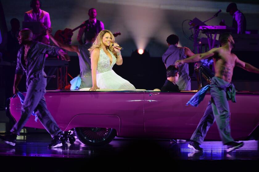 Mariah Carey performs at the Colosseum at Caesars Palace in Las Vegas during the preview of her residency "Mariah #1 to Infinity."