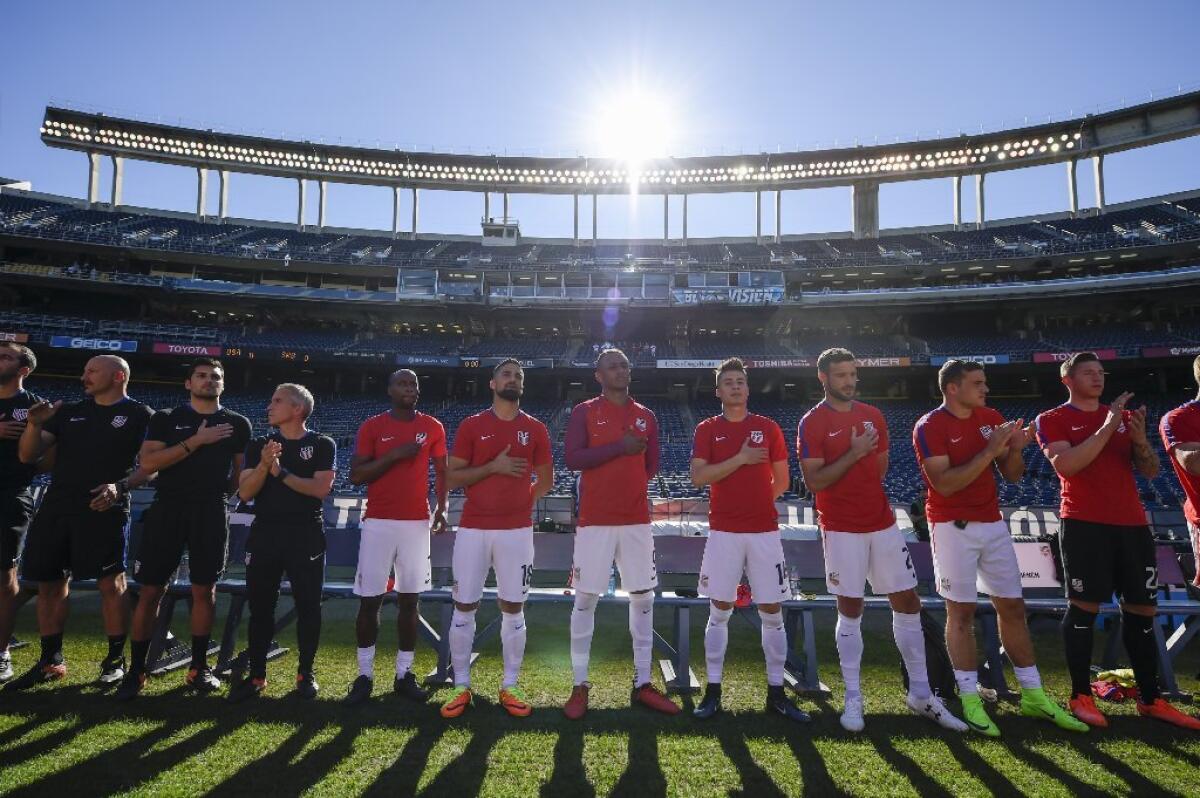 United States players line up during the national anthem before a soccer friendly against Serbia on Jan. 29 in San Diego.