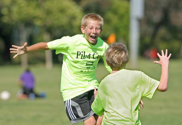 Mariners Connor Kincaid celebrates after putting the game away with another goal during boys 5-6 gold championship game in the Daily Pilot Cup Sunday.