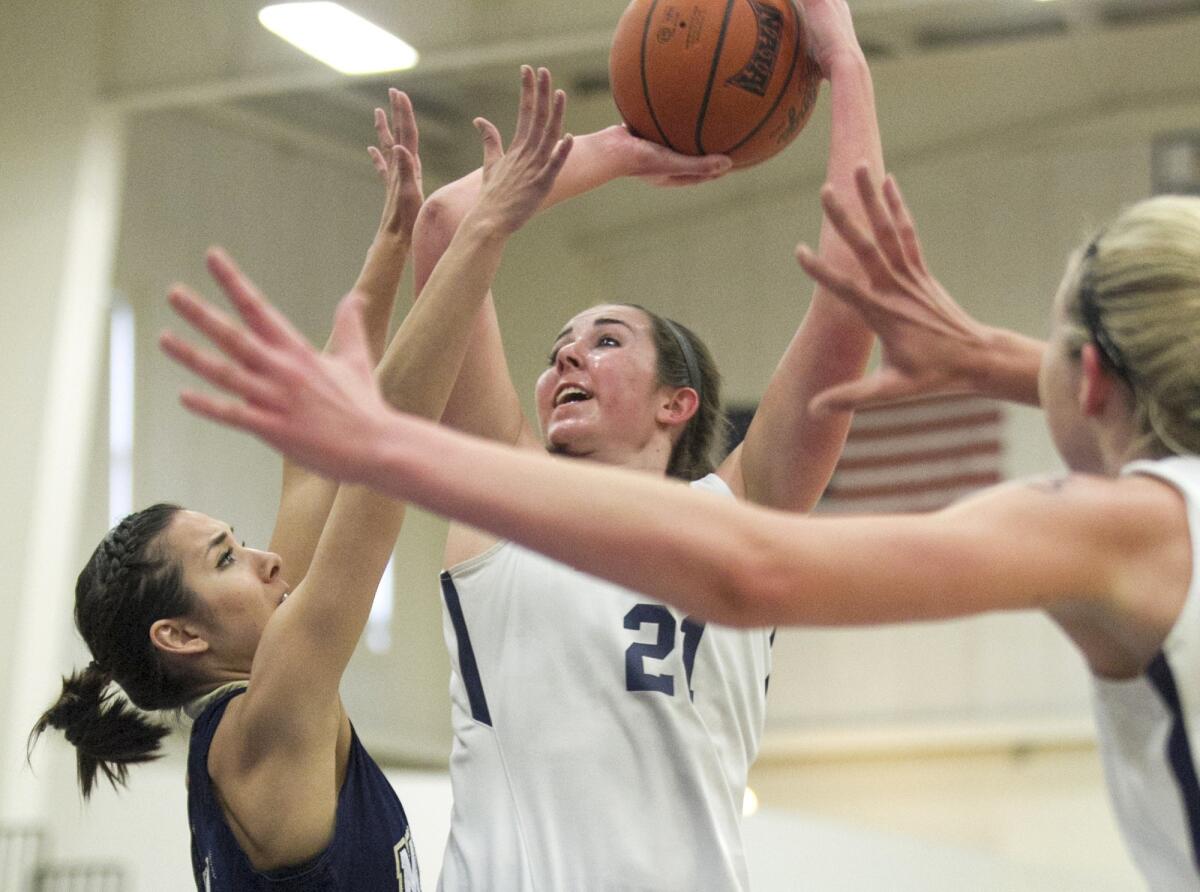 Samantha Doucette, pictured going up for a shot for Vanguard University on March 10, 2015, has been hired to coach the Orange Coast College women's basketball team.