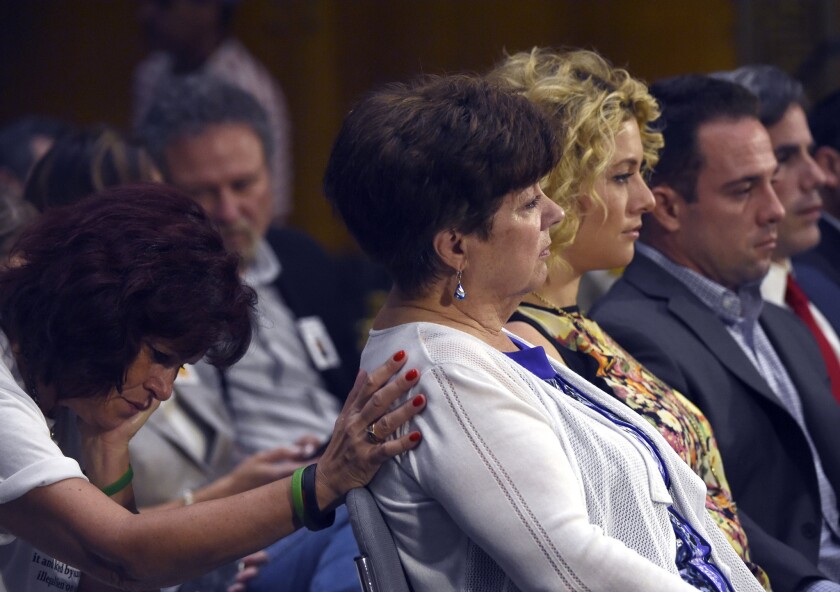 Liz Sullivan, mother of Kathryn Steinle, is consoled by Sabine Durden, left, at a Senate judiciary hearing on immigration policies.