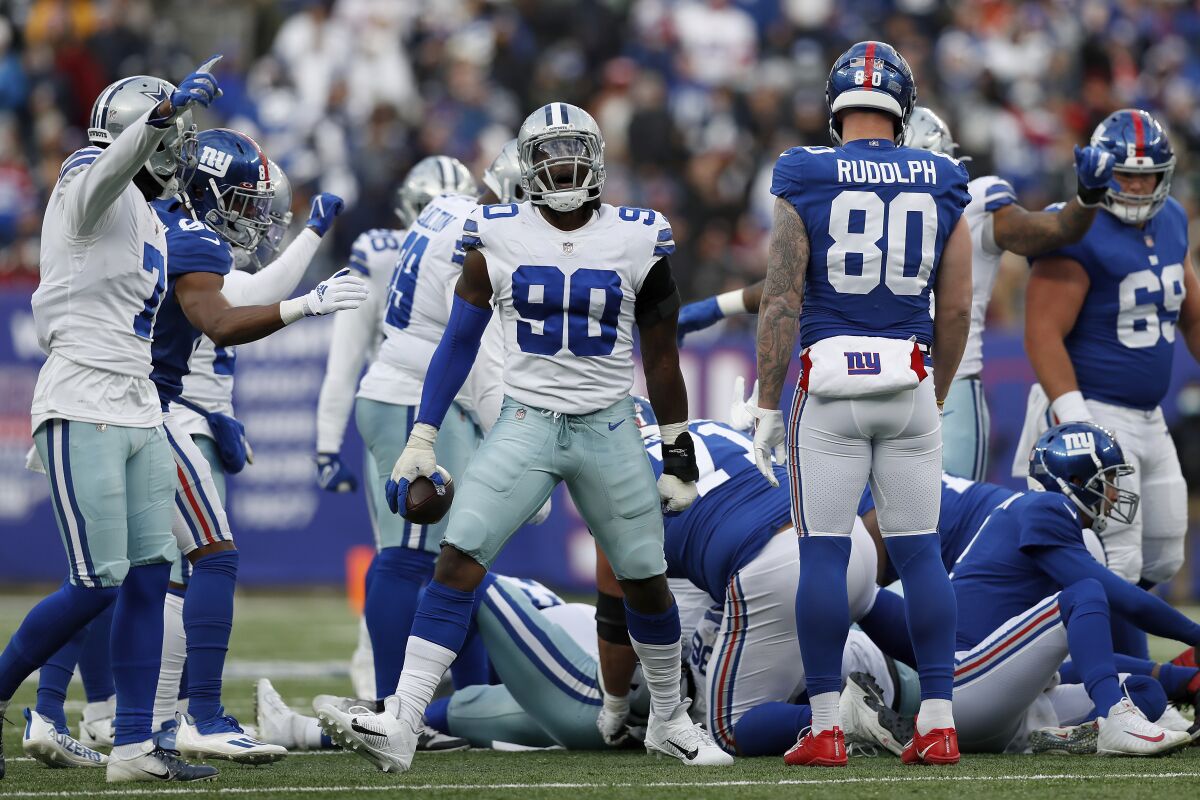 Dallas Cowboys defensive end DeMarcus Lawrence celebrates against the New York Giants.