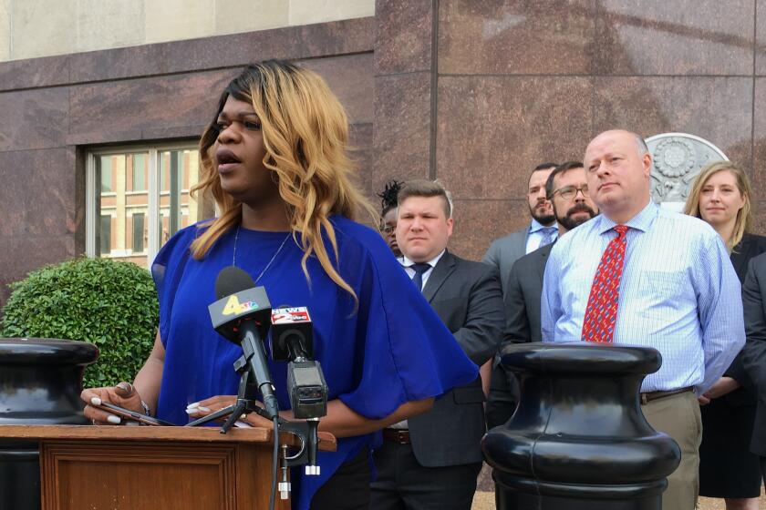 FILE - Lead plaintiff Kayla Gore speaks at a news conference outside the federal courthouse in Nashville, Tenn., April 23, 2019. A federal appeals court panel ruled 2-1 on Friday, July 12, 2024, that Tennessee does not unconstitutionally discriminate against transgender people by not allowing them to change the sex designation on their birth certificates. (AP Photo/Travis Loller, File)