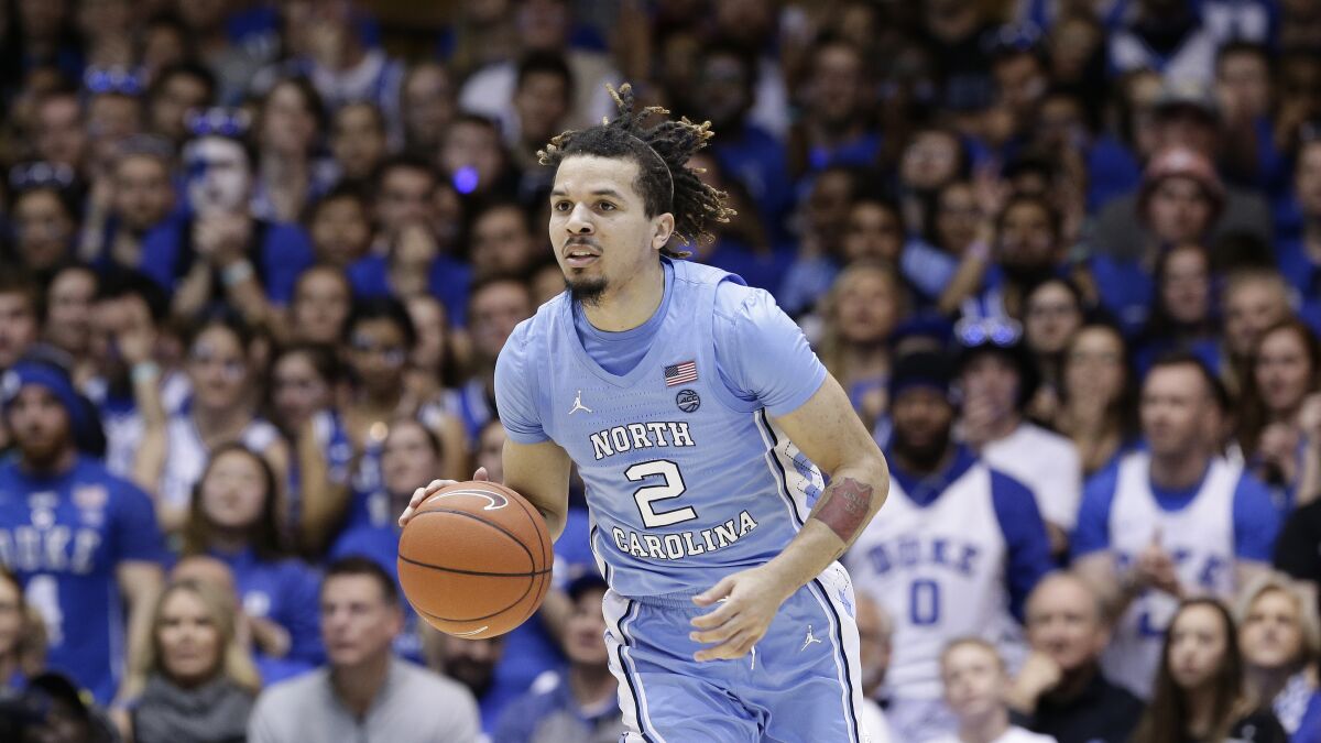 North Carolina guard Cole Anthony dribbles against Duke in March.