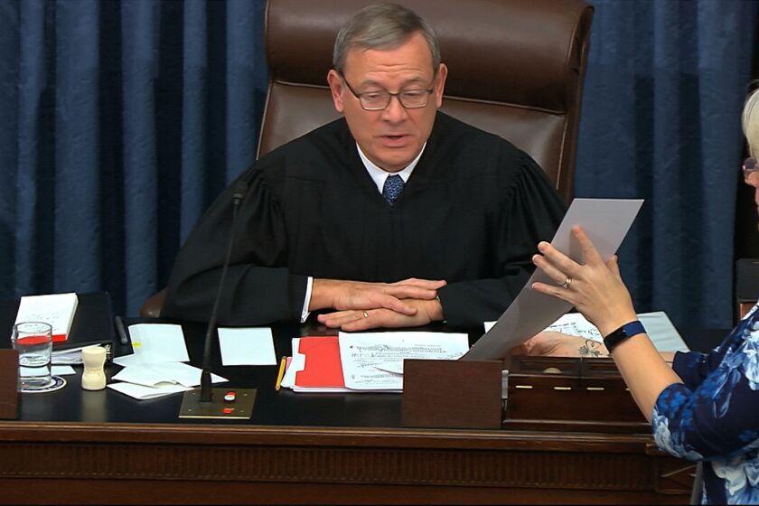 In this image from video, presiding officer Supreme Court Chief Justice John Roberts reads the results of an amendment offered by Senate Minority Leader Chuck Schumer, D-N.Y., during the impeachment trial against President Donald Trump in the Senate at the U.S. Capitol in Washington, Wednesday, Jan. 22, 2020. (Senate Television via AP)