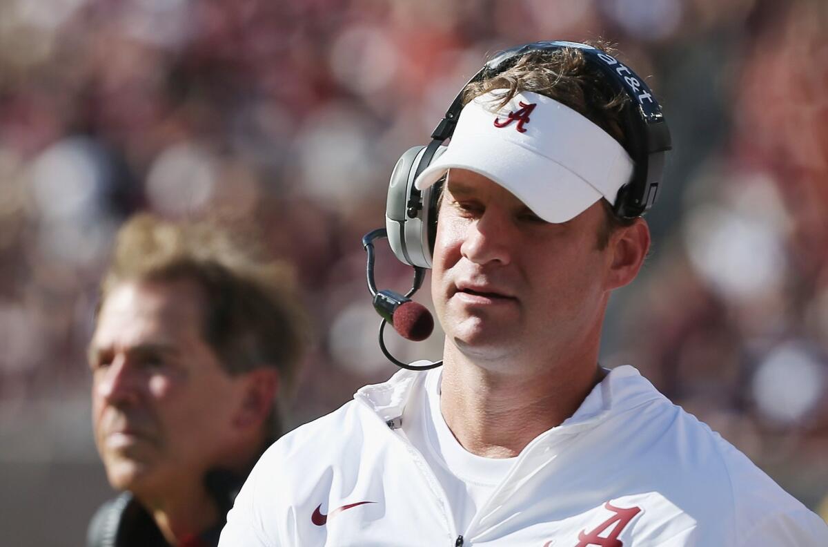 Alabama offensive coordinator Lane Kiffin coaches the Tide against Texas A&M on Oct. 17. Would USC bring him back?