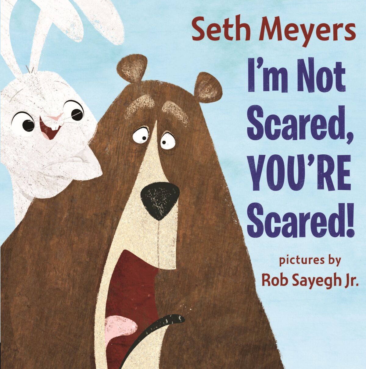 This image provided by Penguin Random House, shows the cover of the childen's book “I’m Not Scared, You’re Scared!”, by Seth Meyers. (Penguin Random House via AP)