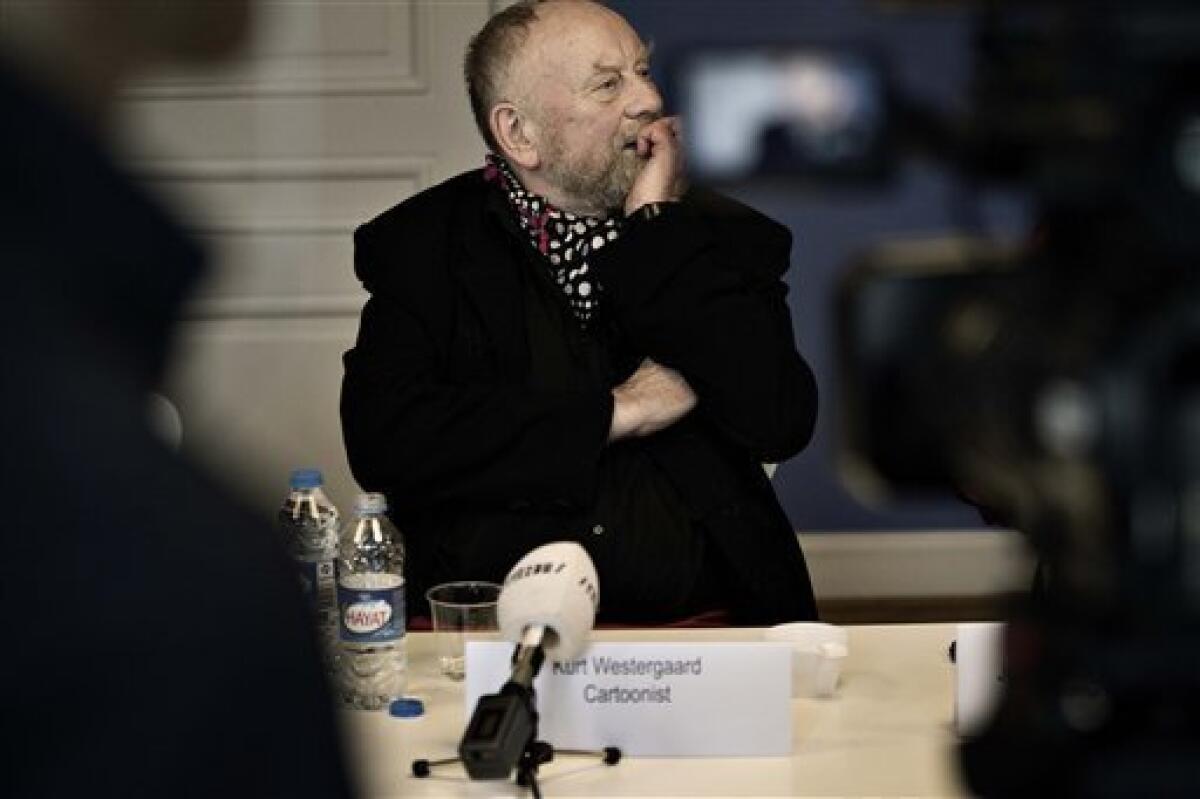 FILE – Danish cartoonist Kurt Westergaard seen in a Nov. 15, 2010 file photo. On New Year's Day, 2010, more than four years after his infamous cartoon rendition of the Prophet Muhammad, a 29 year old Somali man wielding an axe broke into his home in an alleged attempt to kill Westergaard who will be facing his attacker in court as his trial starts Wednesday Jan. 19 2011 in Aarhus, Denmark. Following publication of the cartoons violent protests rippled across the Muslim world, with furious mobs torching Danish flags and consulates. Dozens of people were killed. (AP Photo/POLFOTO, Joachim Adrian, file) DENMARK OUT