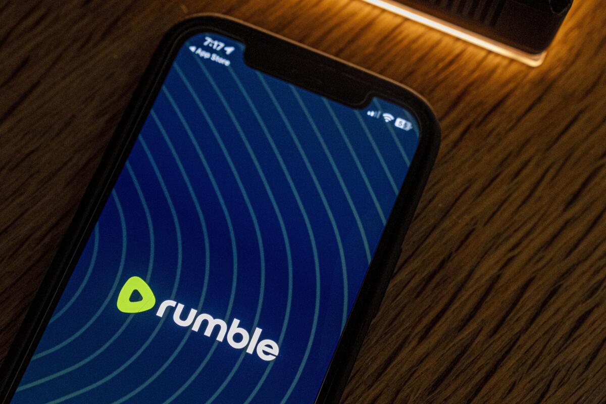 Smartphone displaying logo for Rumble app