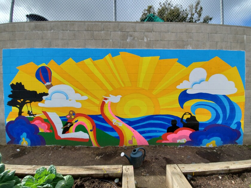 The mural in the school garden.