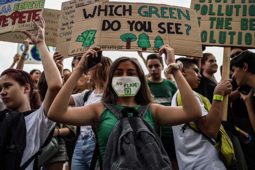 People holding placards reading messages for the safeguard of the environment take part in a demonstration rally in front of the Greek Parliament during the "Fridays for climate" to protest against climate change in in Athens on September 20, 2019. (Photo by ANGELOS TZORTZINIS / AFP)ANGELOS TZORTZINIS/AFP/Getty Images ** OUTS - ELSENT, FPG, CM - OUTS * NM, PH, VA if sourced by CT, LA or MoD **