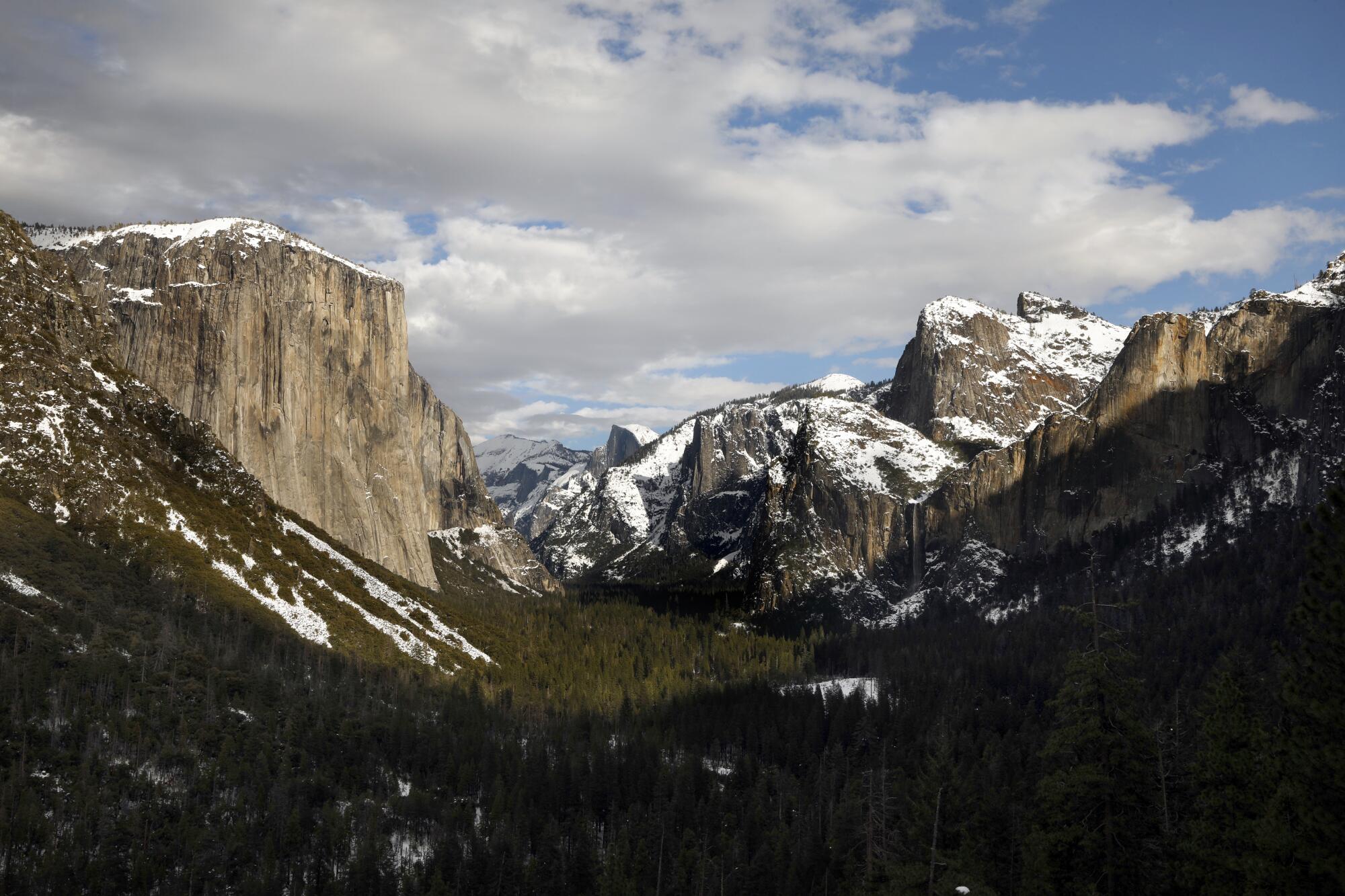El Capitan and Cathedral Rocks dusted with snow. 
