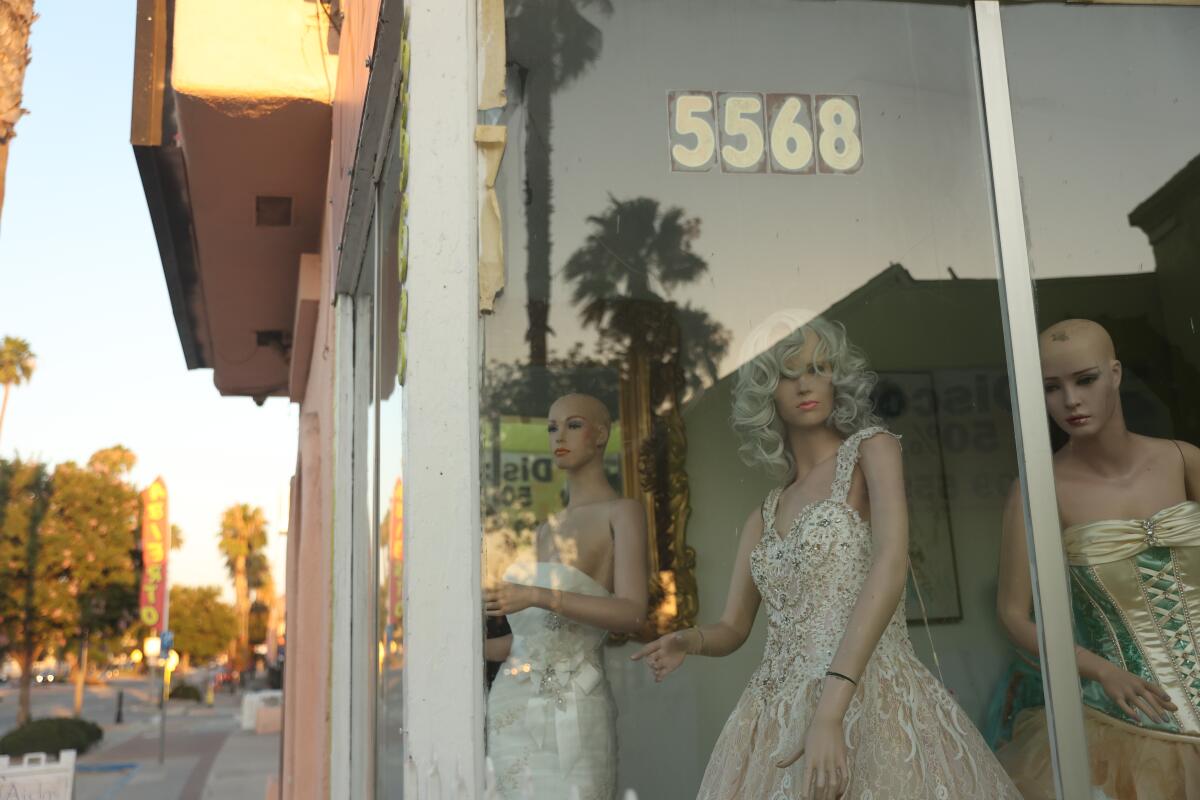 Mannequins are displayed at the store next to Rubidoux Fashion.
