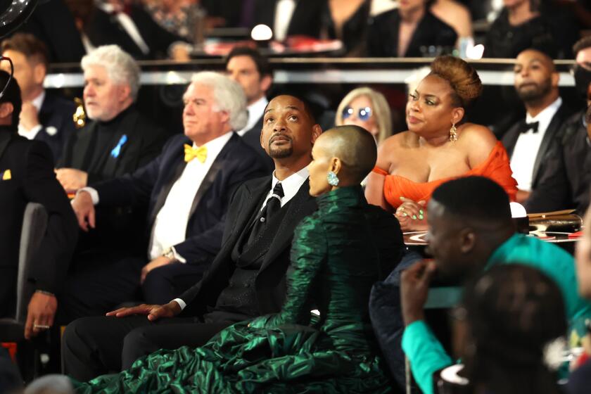 HOLLYWOOD, CA - March 27, 2022. Will Smith accepts the award for Best Actor in a Leading Role for "King Richard" during the show at the 94th Academy Awards at the Dolby Theatre at Ovation Hollywood on Sunday, March 27, 2022. (Robert Gauthier / Los Angeles Times)