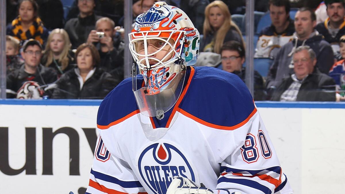 Edmonton Oilers goalie Ilya Bryzgalov looks on during a game against the Buffalo Sabres in February. Bryzgalov, who began his NHL career in Anaheim, is expected to start for the Ducks this week.