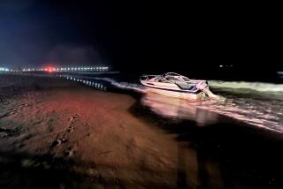 U.S. Customs and Border Patrol officers are investigating a boat that washed ashore Monday night in Huntington Beach.