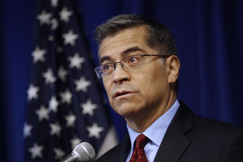 FILE - In this Dec. 4, 2019, file photo, California Attorney General Xavier Becerra speaks during a news conference in Sacramento, Calif. Becerra has sued the state Republican Party and wants to know the names and contact information of every voter who has put a ballot in one of the Republican Party's unofficial ballot drop boxes. (AP Photo/Rich Pedroncelli, File)