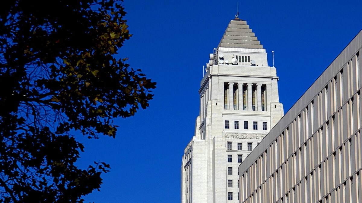 Los Angeles City Hall against a blue sky