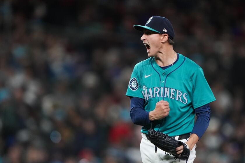 Seattle Mariners starting pitcher George Kirby reacts after striking out Arizona Diamondbacks' Eugenio Suárez to end the top of the seventh inning of a baseball game Saturday, April 27, 2024, in Seattle. (AP Photo/Lindsey Wasson)