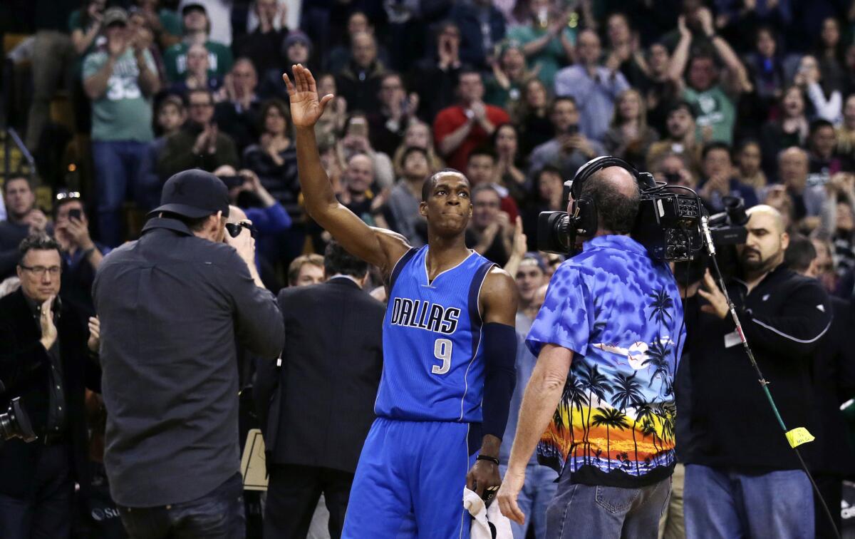 Mavericks guard Rajon Rondo received a standing ovation from Celtics fans in his first appearance at the TD Garden in Boston since he was traded to Dallas in December. The Mavericks beat the Celtics, 119-101.