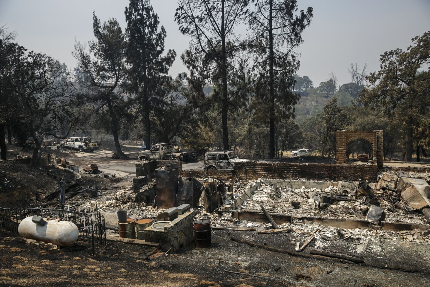 A home destroyed by the Detwiler fire along Hunters Valley Road near Mariposa, Calif.