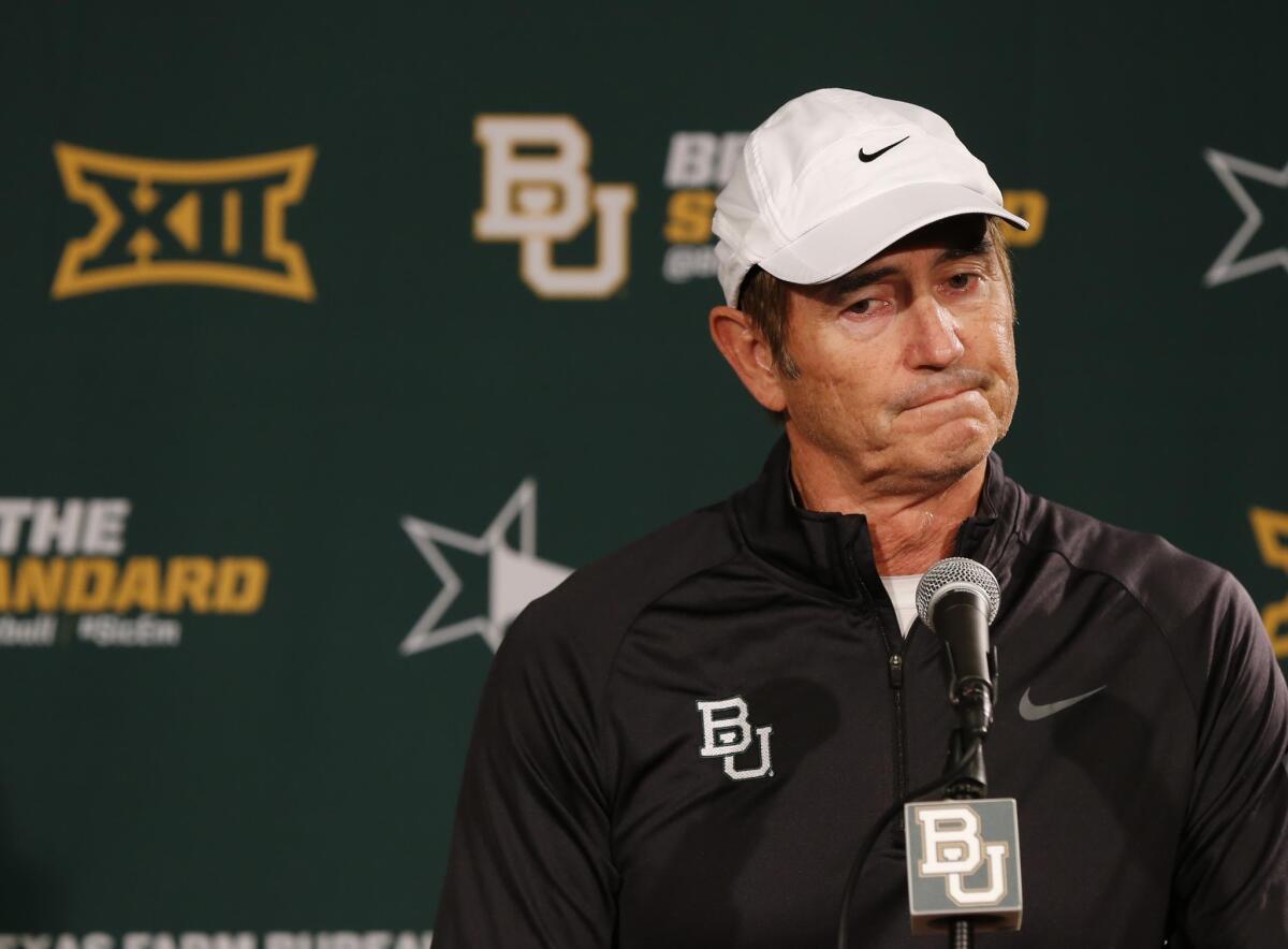 Art Briles responds to questions during a news conference on Dec. 7, 2014.